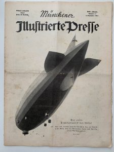Die Titelseite der Zeitschrift zeigt einen Zeppelin auf weißem Grund, von unten fotografiert.