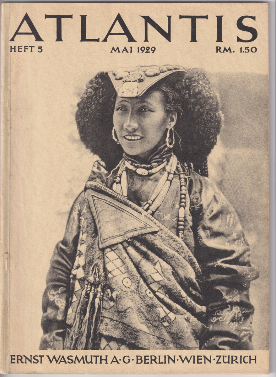 Cover eines Zeitschriftenhefts mit dem Bild einer jungen Frau in traditioneller Kleidung