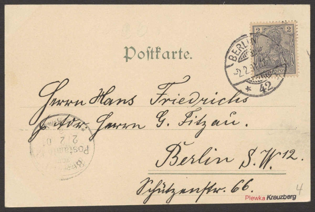 Rückseite einer Ansichtskarte mit handgeschriebener Adresse und Briefmarke