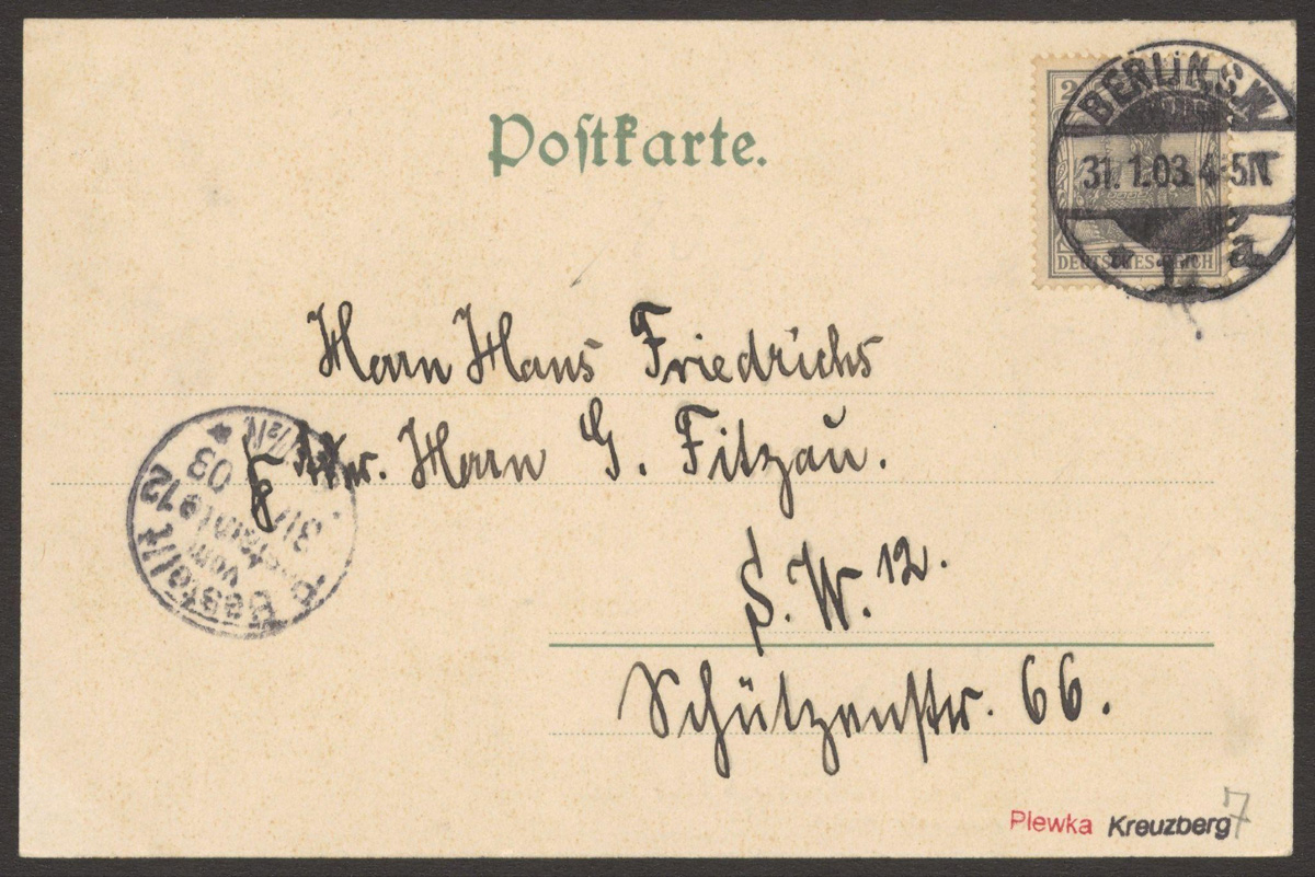 Rückseite einer Ansichtskarte mit handgeschriebener Adresse und Briefmarke